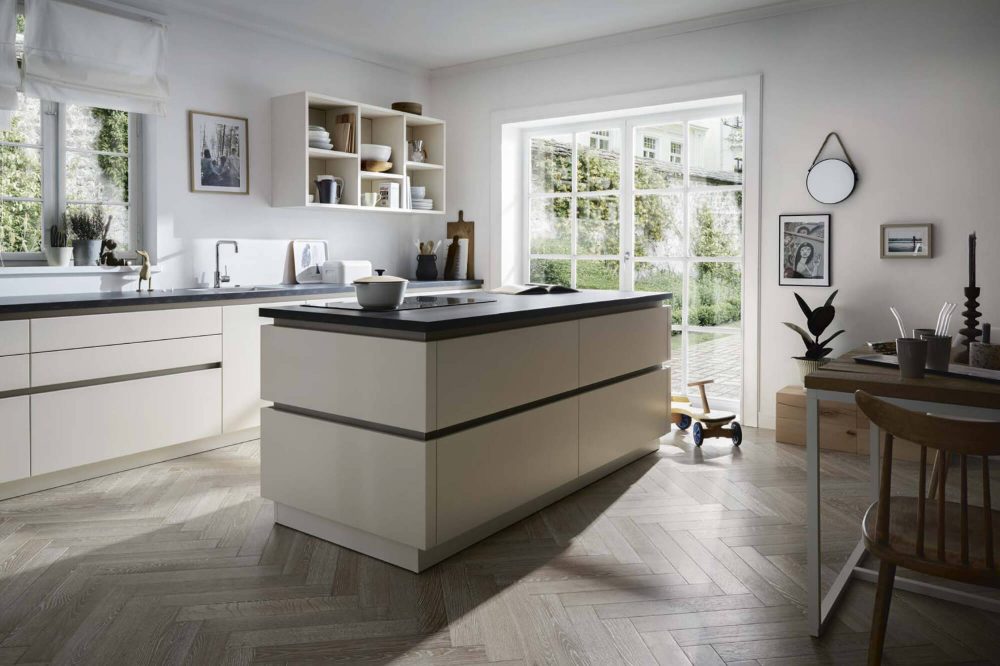 German kitchen with island in Magnolia Handleless