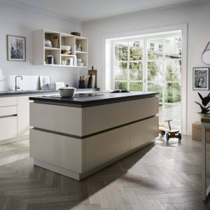 German kitchen with island in Magnolia Handleless