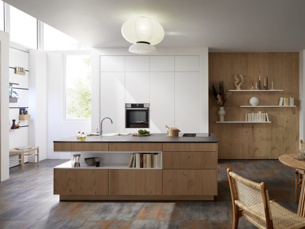 German kitchen with island in crystal white and light oak