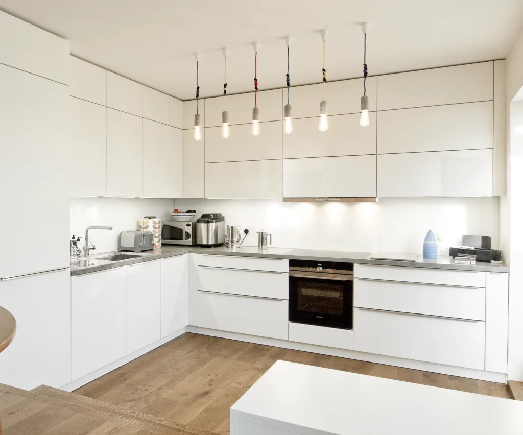 A white German kitchen in a Victorian terraced house