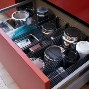 Kitchen drawer with dividers and storage jars