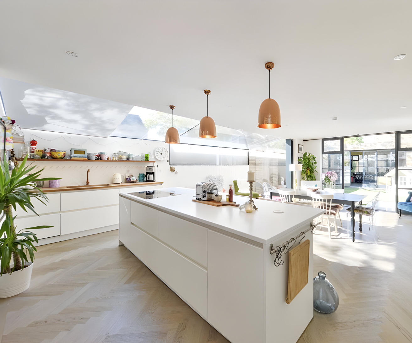 White handleless kitchen in Queens Park house